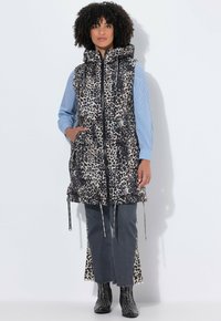 Стеганый жилет