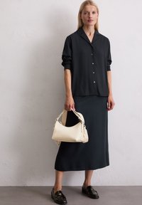 Кожаная сумка