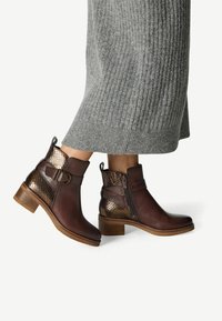 Ковбойские сапожки