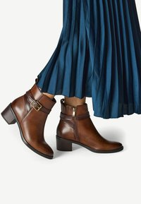 Ковбойские сапоги