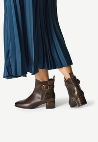 Ковбойские сапоги