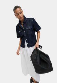 Джинсовая жилетка