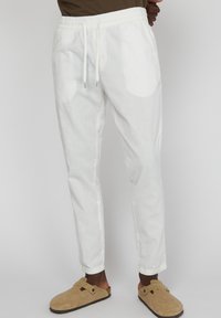 Льняные брюки