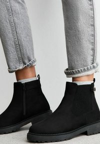 Широкие сапоги