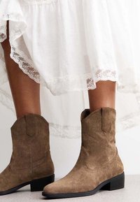 Ковбойские сапоги