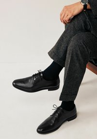 Ботинки на шнуровке