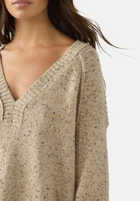 Длинный пуловер