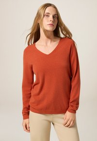 Длинный пуловер