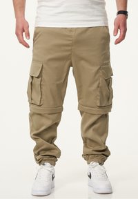 Брюки с накладными карманами