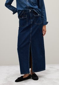 Джинсовая юбка Джинсовая юбка