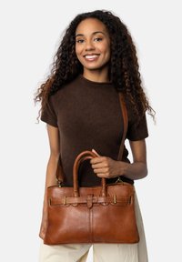 Кожаная сумка