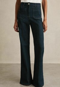 Клешеные джинсы Клешеные джинсы