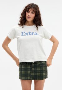 Юбка с накладными карманами