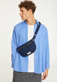 Сумка на пояс