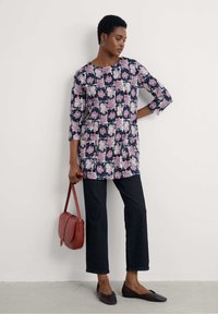 Длинная блузка