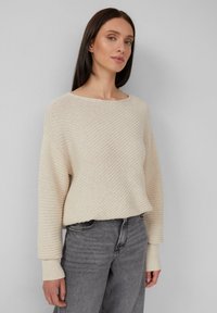 Длинный пуловер