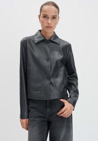 Кожаная куртка