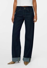 Свободные джинсы Свободные джинсы