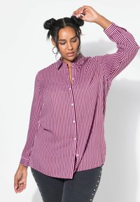 Длинная блузка