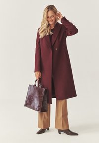 Шерстяное пальто