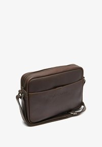 Кожаная сумка