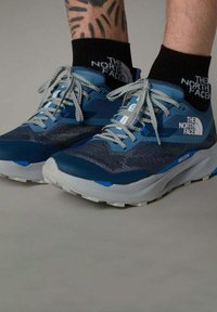 Беговые кроссовки