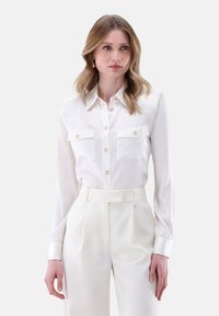 Шелковая блузка