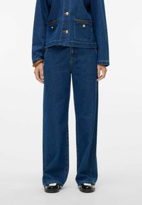 Свободные джинсы