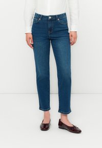 Свободные джинсы