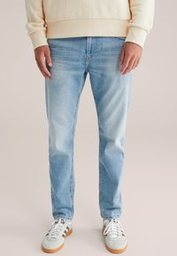 Узкие джинсы