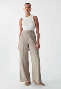 Широкие брюки Широкие брюки