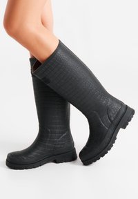 Резиновые сапоги