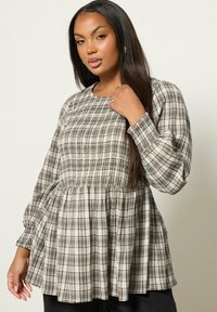 Длинная блузка Длинная блузка