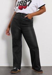 Клешеные брюки