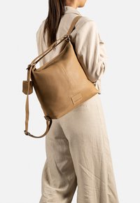 Кожаная сумка