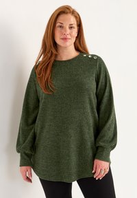 Длинный пуловер