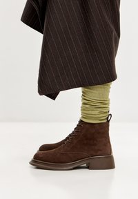 Ботинки на шнуровке