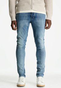 Узкие джинсы