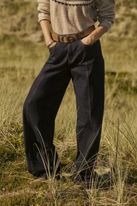 Клешеные джинсы