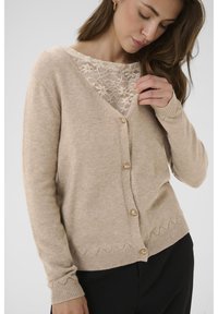 Вязаная кофта