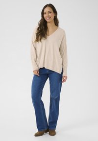 Длинный пуловер