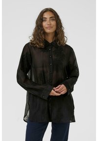 Длинная блузка