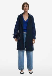 Шерстяное пальто