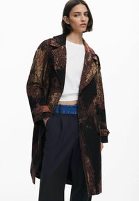 Шерстяное пальто