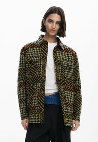 Шерстяное пальто