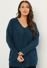 Длинный пуловер