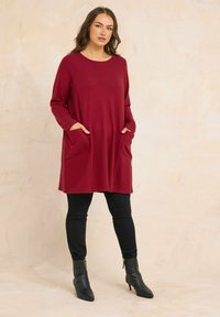 Длинный пуловер