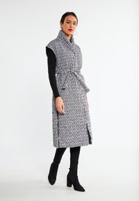 Шерстяное пальто