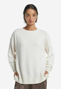 Длинный пуловер