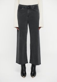 Джинсы бойфренда